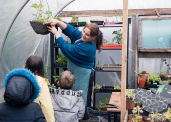 Change Makers Hub people in polytunnel